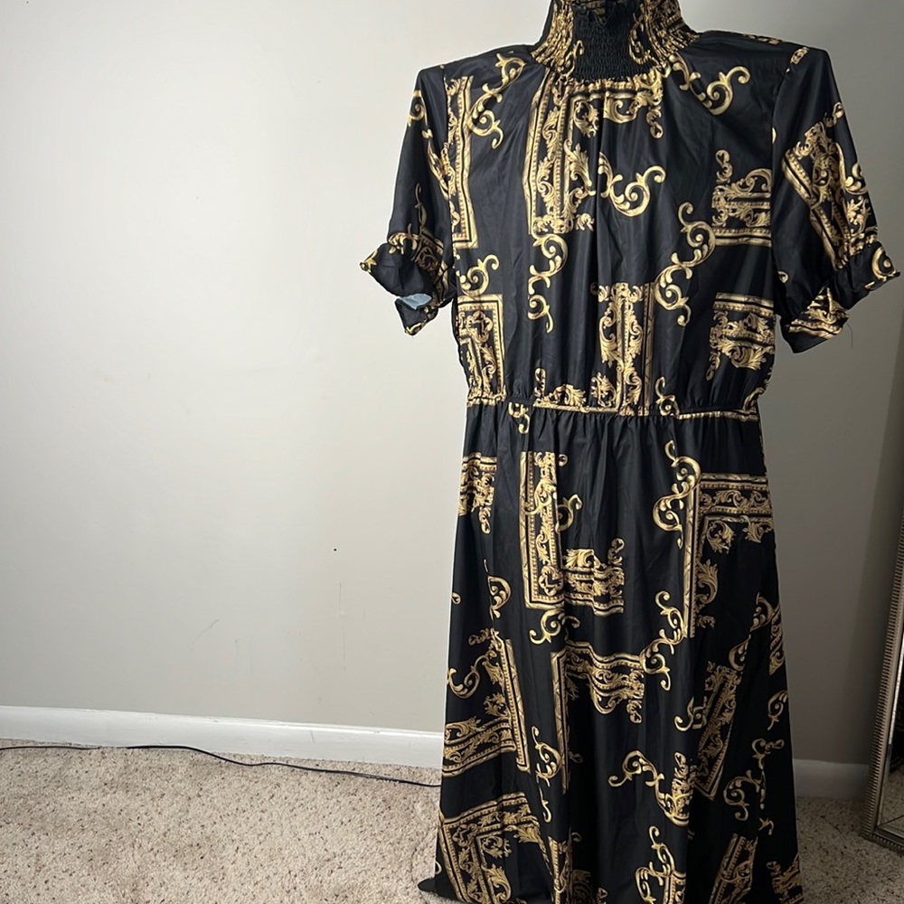 Black and gold dress never been worn